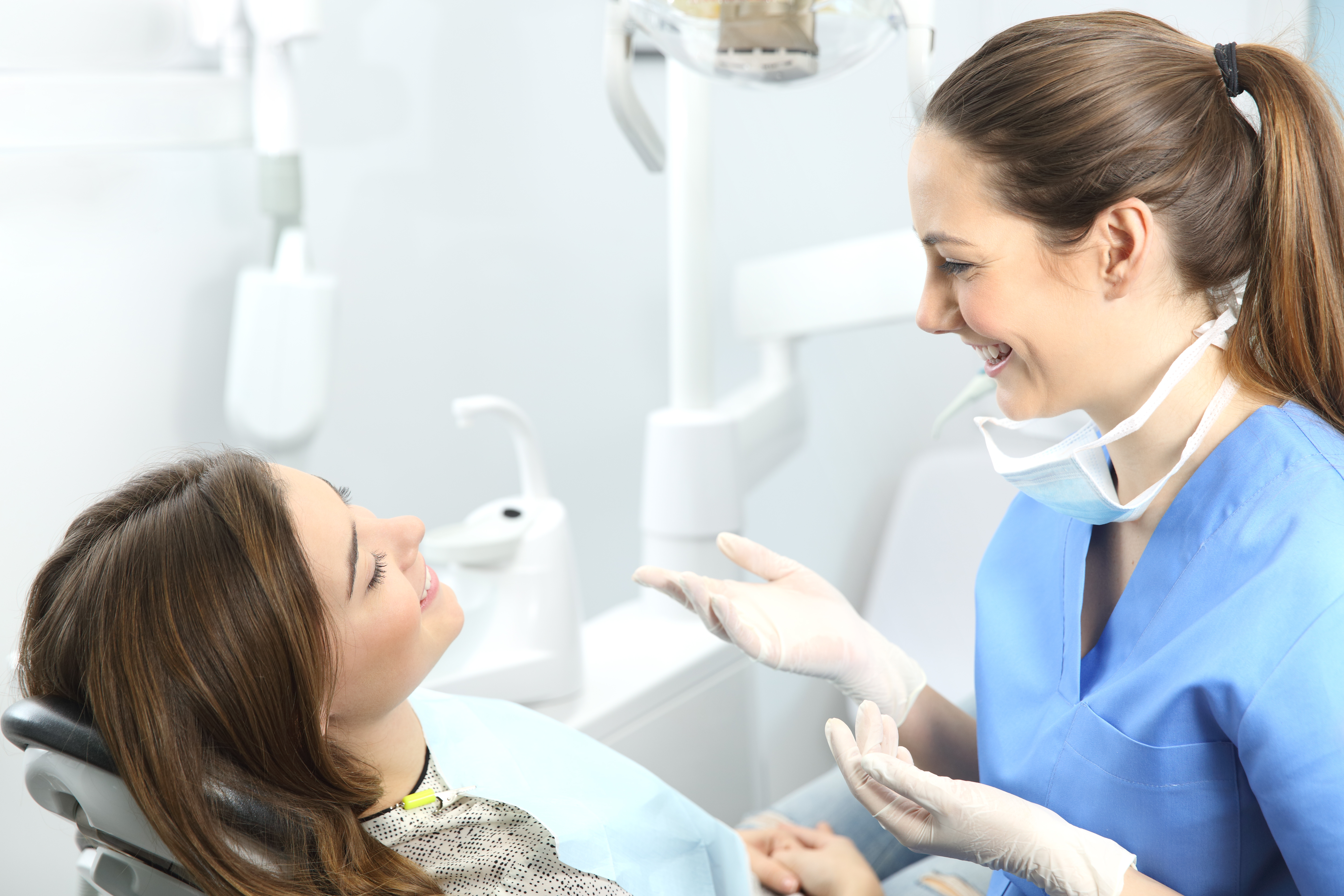 Dentist having a reassuring conversation with a patient