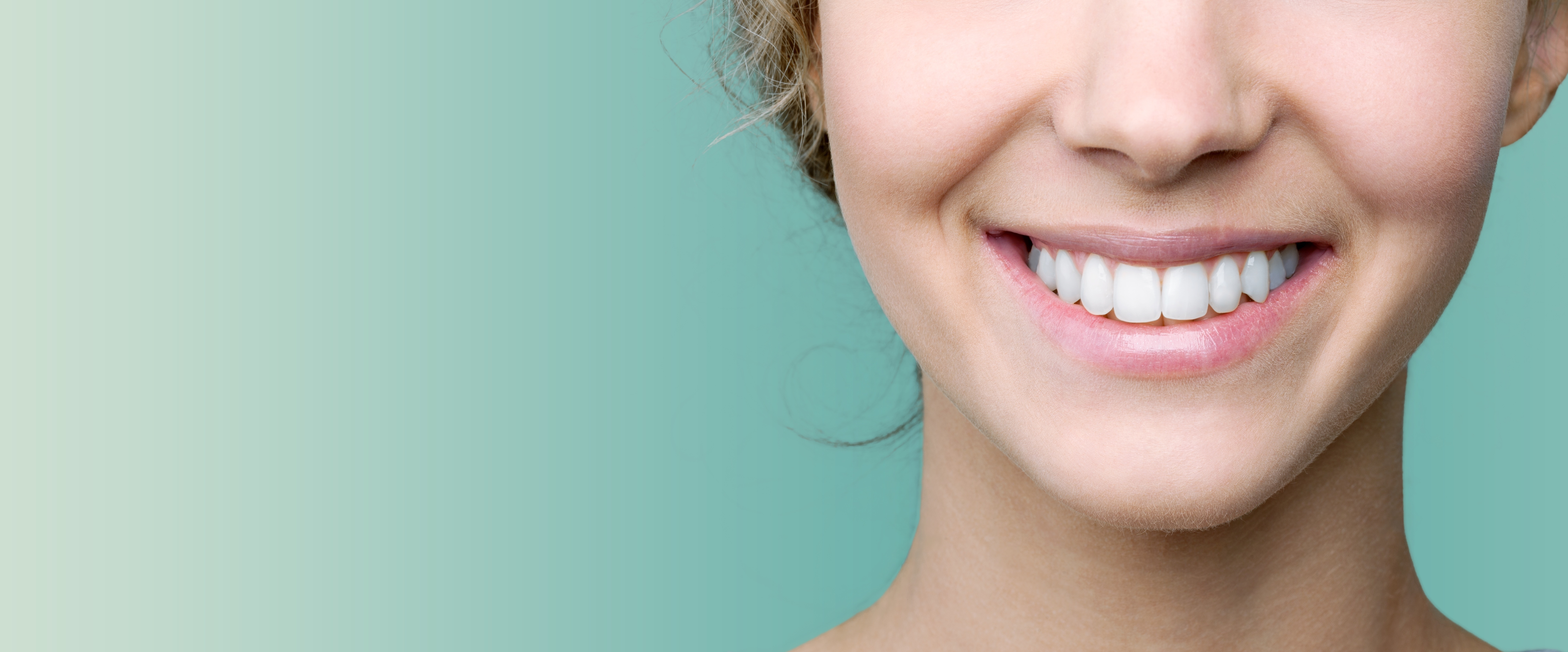 A relaxed smiling woman in warm natural light