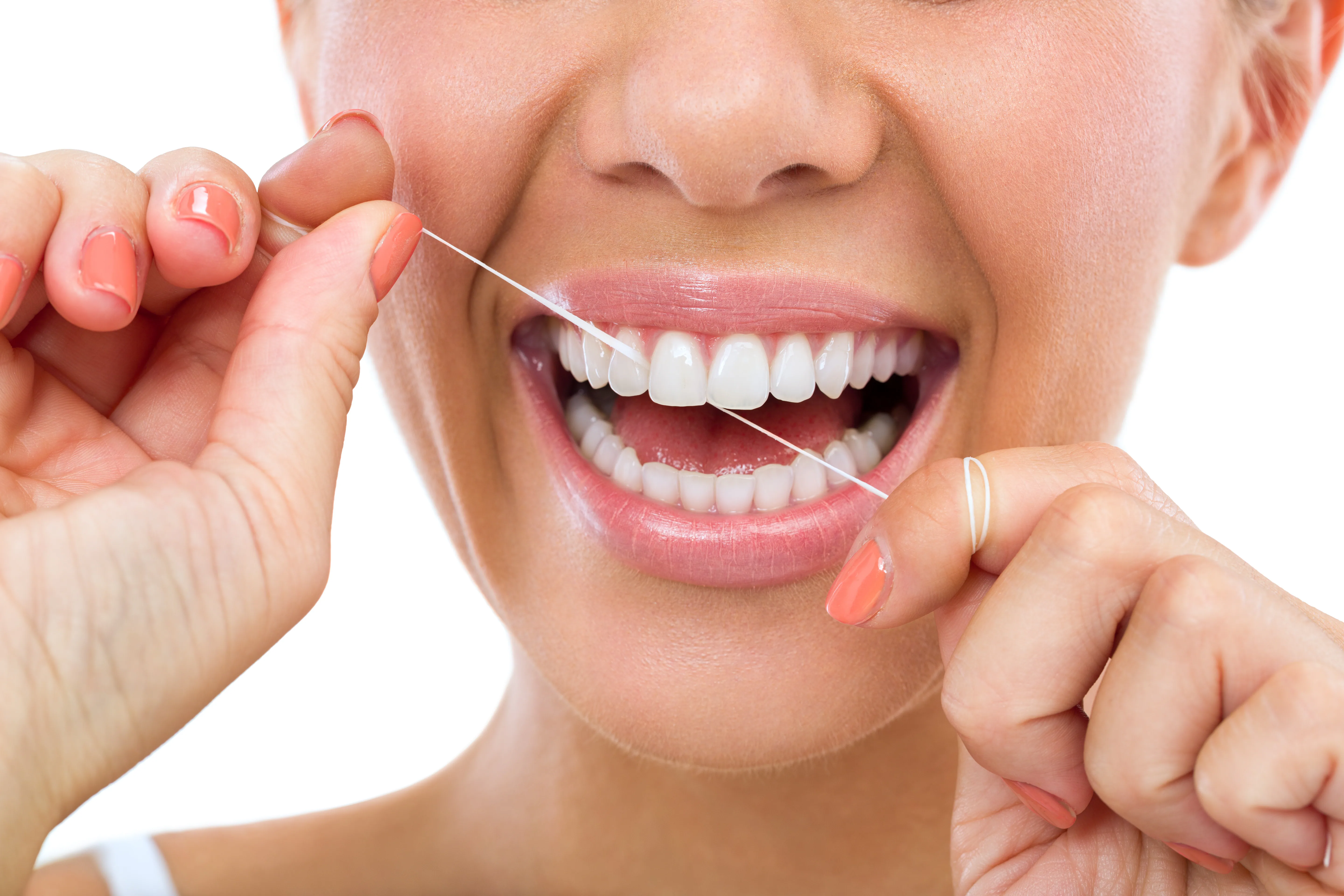 Dental professional explaining an implant model